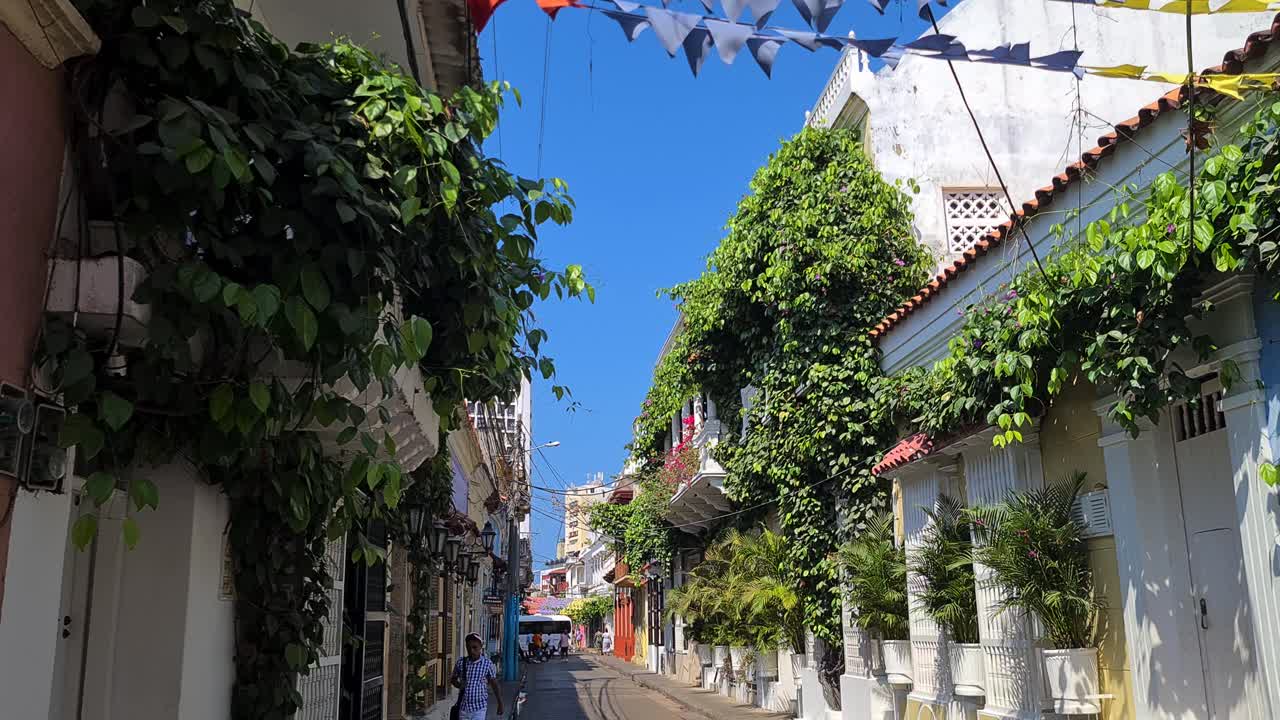 Cartagena, Colombia. Idyllic Street in Old Town, Colonial Buildings and Creeping Plants