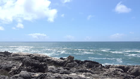 clean ocean and a rocky shore