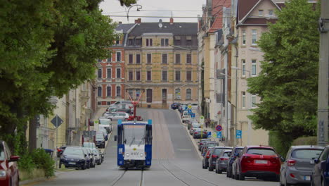 tram on a hilly street in a german city