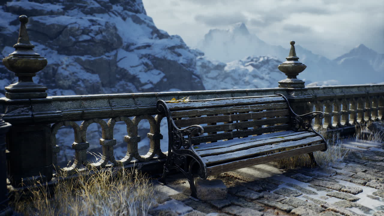 Snow covered bench near mountains showcases winters beauty in nature