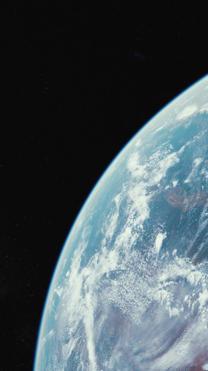 una vista de la tierra desde el espacio, mostrando sus océanos azules, nubes blancas y la oscura extensión del espacio