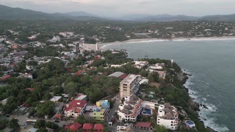 beaches of puerto escondido, oaxaca, mexico, with a view of beachfront houses and residences near manzanillo beach