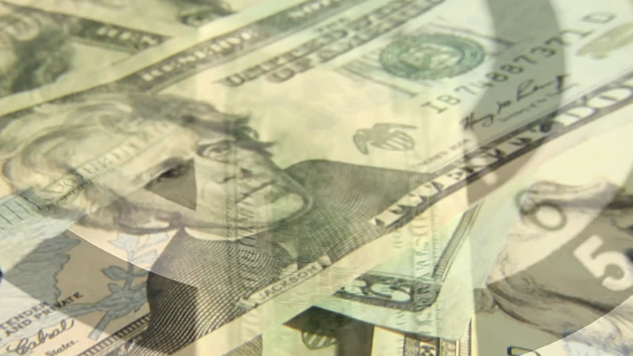 Animation of bull's eye and american dollar banknotes falling