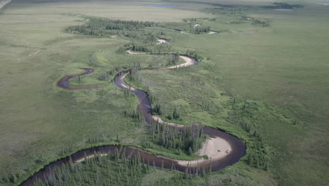 unique creek in alaska in a shape of a windy snake
