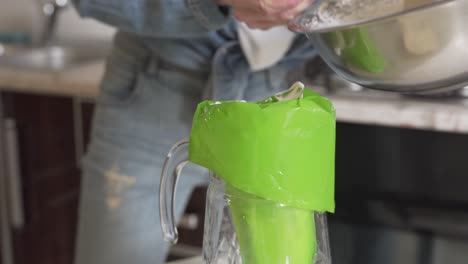 Girl-preparing-whipped-cream-for-the-cake-decoration