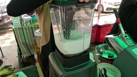 sequence of making a fresh coconut smoothie