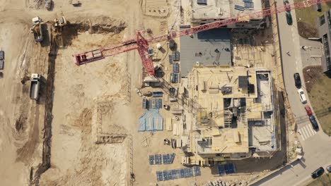 busy construction site and construction equipment aerial