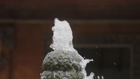 Traditional-Balinese-stone-fountain-with-flowing-water