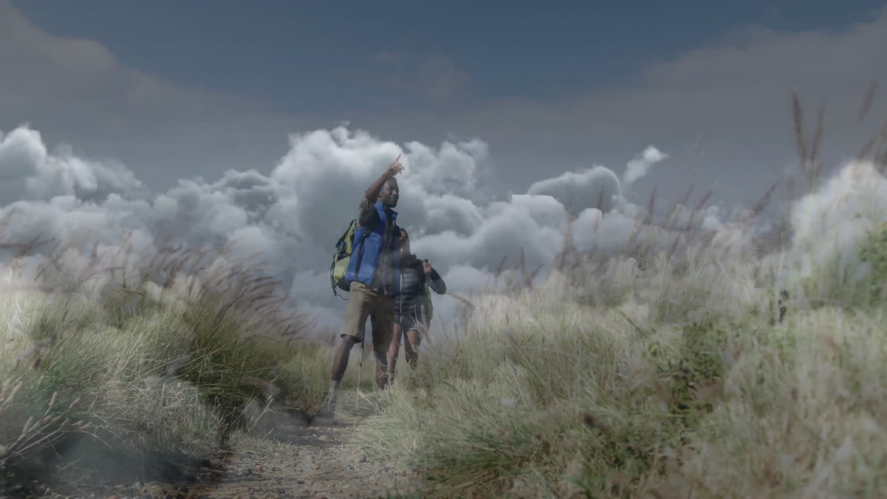 hikers shading eyes hiking trail, with animated elevation chart and health icons