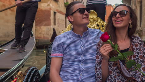 couple enjoying a romantic gondola ride in venice