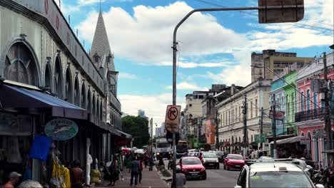 brazil, belem, the ver-o-peso market and surroundings:panorama of the ver-o-peso market street, capturing the lively atmosphere, color stalls, and bustling activity. a vibrant snapshot of daily life