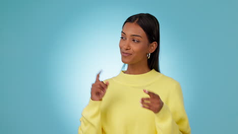 face, woman and pointing to advertising in studio