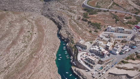 aerial drone shot of a natural valley along the coast of the mediterranean island, wied iz-zurrieq, malta