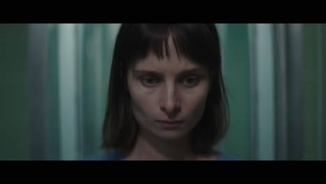 a girl in a strange operation room at night