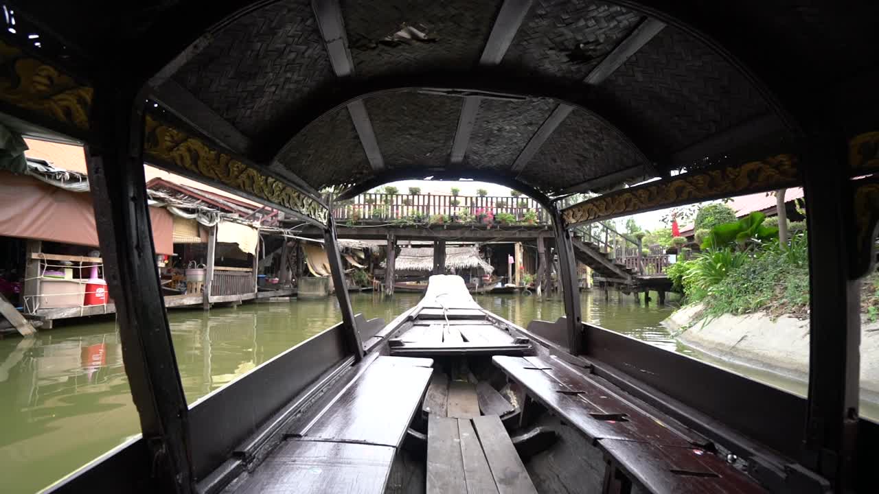 View Inside A Wooden Boat Sailing In The River In Thailand - rolling shot