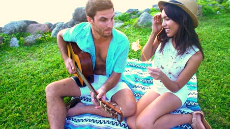 portrait of caucasian man hispanic woman enjoying picnic