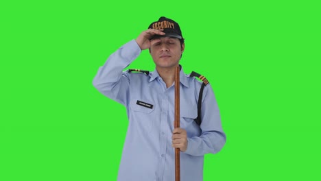 Feliz-Guardia-De-Seguridad-Indio-Preparándose-Para-La-Pantalla-Verde-De-Servicio