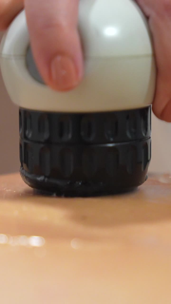 Body treatment with massage device