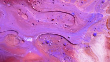 abstract fluid art in purple and pink