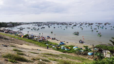 vietnamese fishing boats floating and sailing in mui ne harbor, timelapse