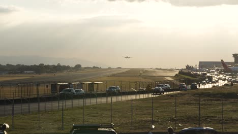 plane landing during sunny afternoon at costa rica juan santa maria airport in alajuela