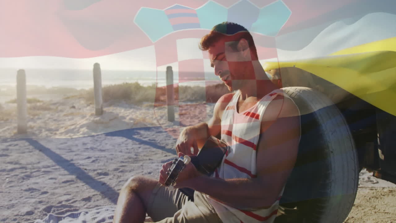 Man playing guitar on beach with colorful geometric animation overlay