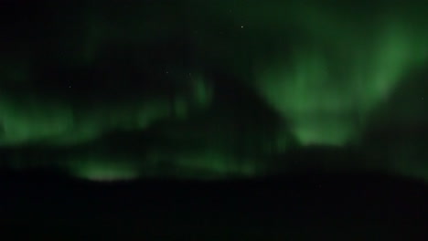 Northern-Light-Aurora-Borealis-Seen-From-An-Airplane-Flying-over-Greenland