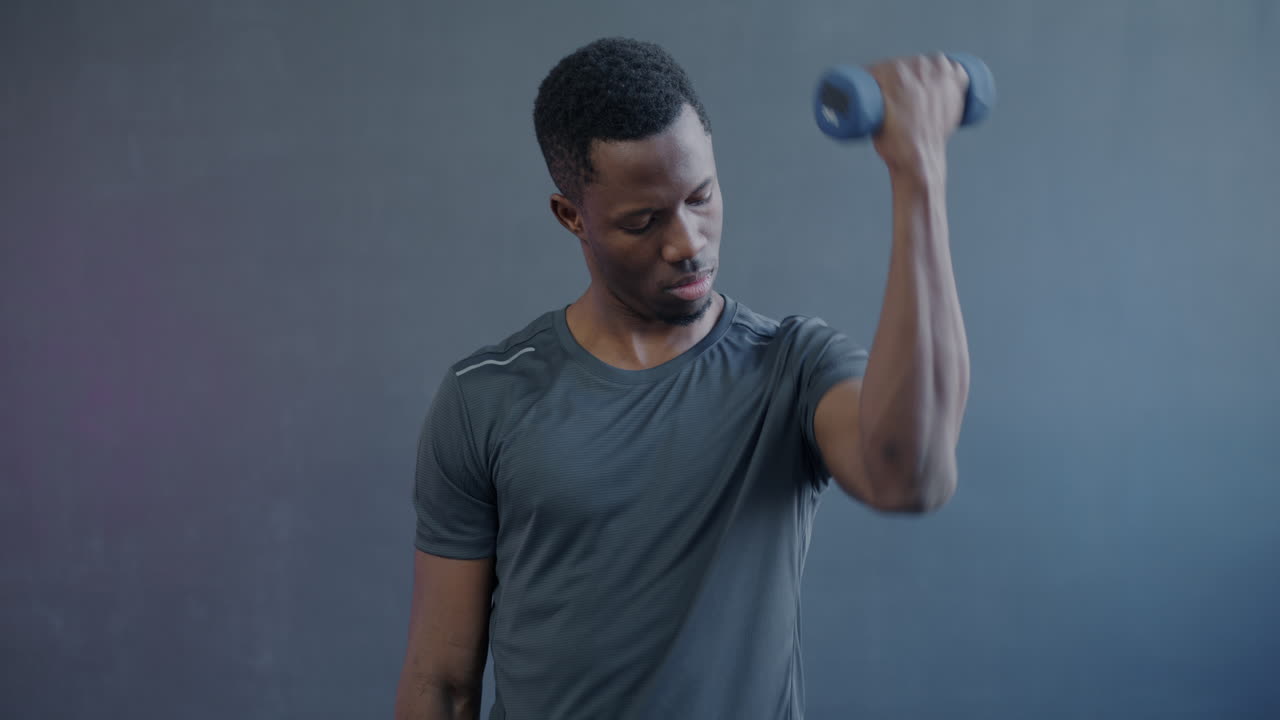 Man lifting dumbbell