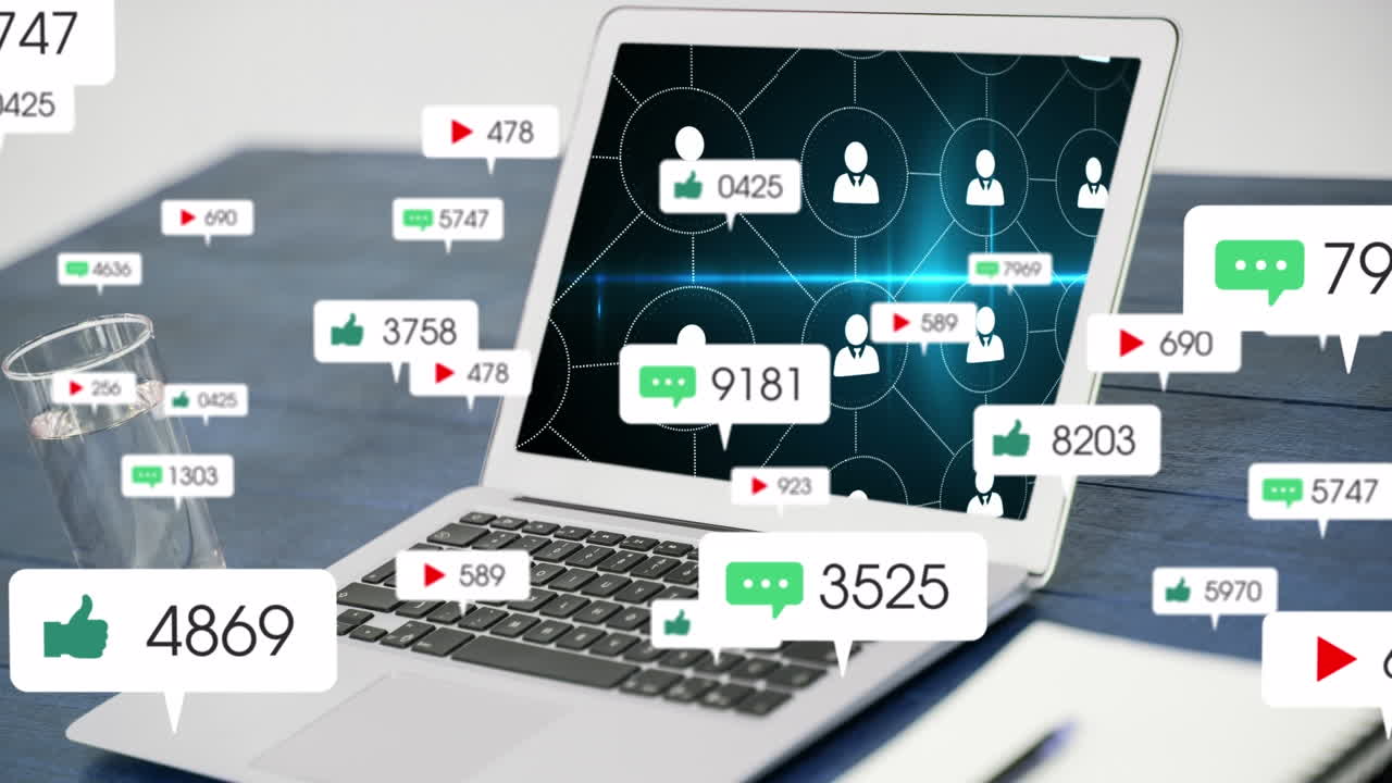 Animation of falling icons over laptop