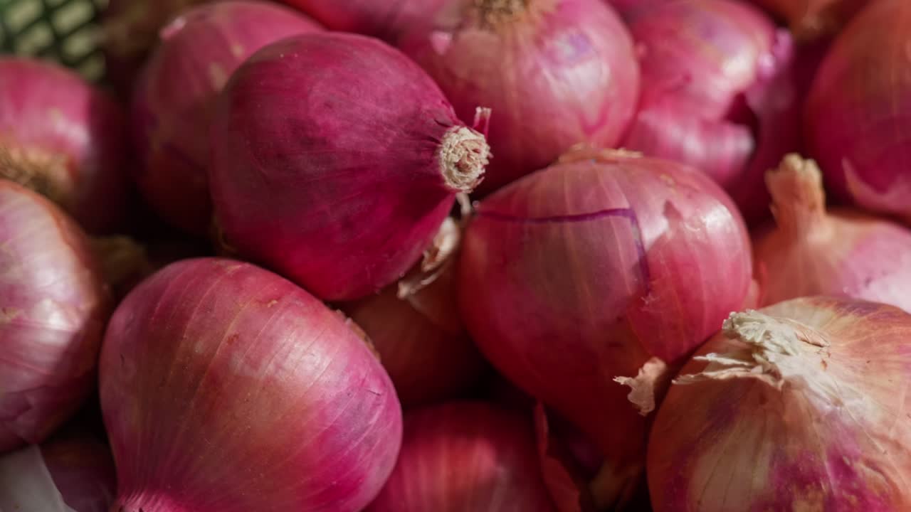 Close-Up of Fresh Red Onions in a Basket. internal shot, parallax shot, 4k.