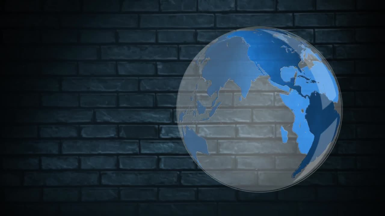 tierra digital girando contra una pared de ladrillo oscuro