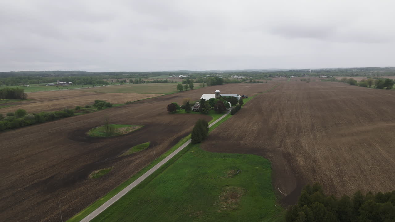 Plowed Fields In The Countryside Of Schomberg, Ontario, Canada. - aerial shot