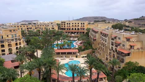 aerial view of a hotel complex and its surroundings in the maltese island of gozo