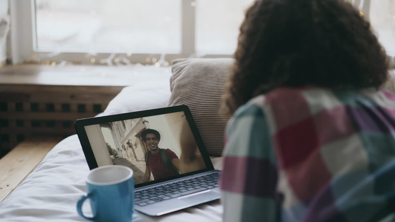 Video Call with a Friend in a Cozy Bedroom