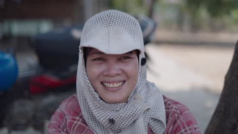portrait of a smiling woman farmer