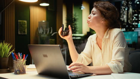 vertical video executive manager reflecting on a tactical decision and playing with stapler