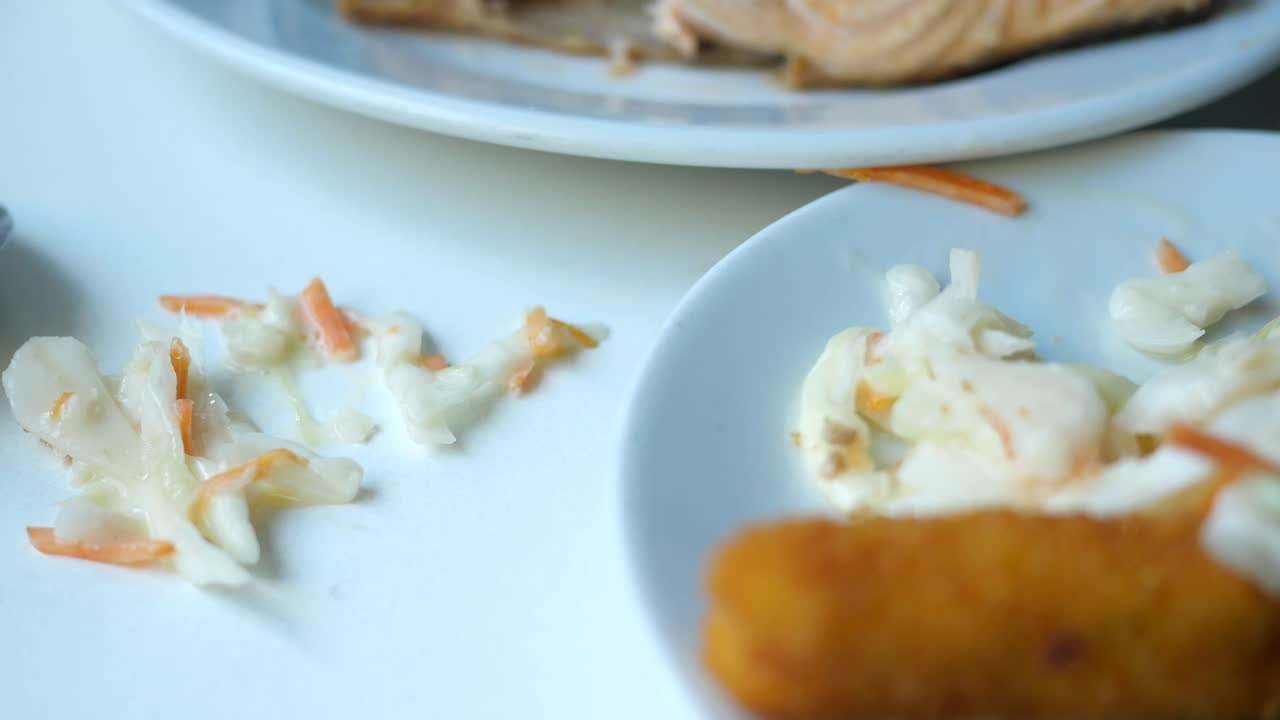 Leftover Coleslaw and Spoon on Table