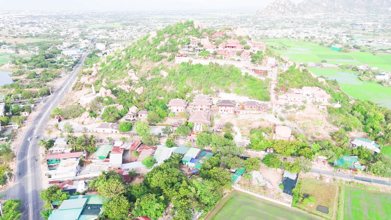Aerial View Orbit of the Buddhist temple in Phan Rang–Tháp Chàm in the morning.