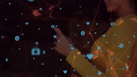 woman wearing mustard top pointing forward, interacting with health icons over orange network lines
