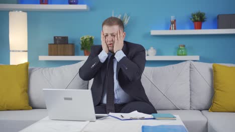 home office worker man see his failure on laptop.