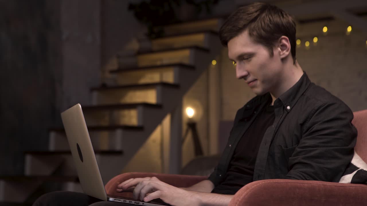 Man working on a laptop at home