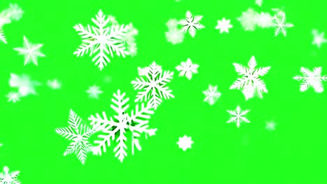 copos de nieve cayendo en la pantalla verde