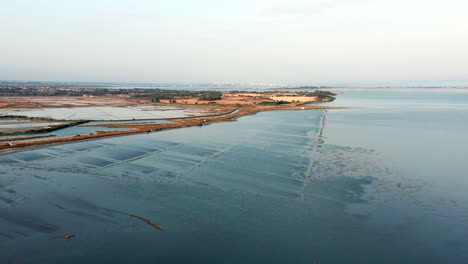 Aerial-drone-footage,-pond-beach-near-Montpellier,-France