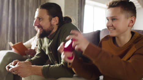 Caucasian-men-and-boy-in-the-living-room