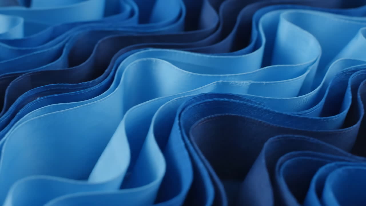 Abstract Blue Fabric Waves and Folds
