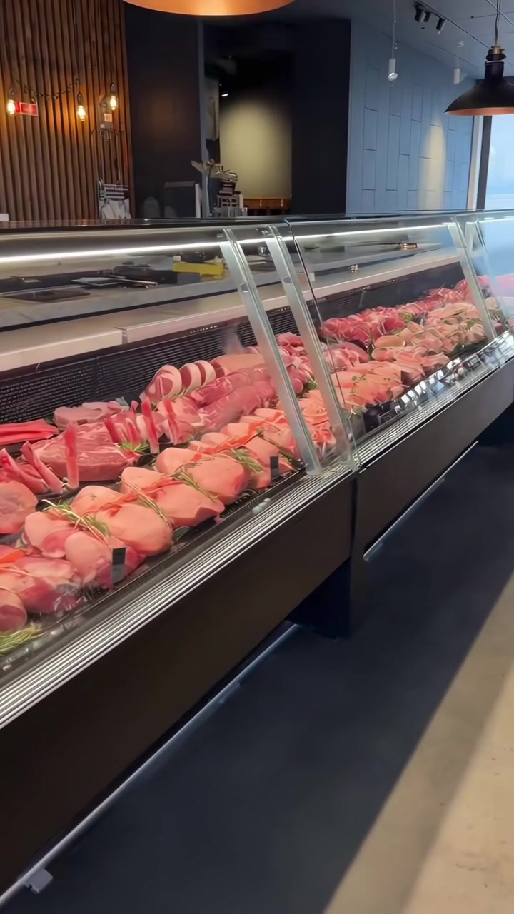 Premium Raw Meat Steaks and Cuts in a Refrigerated Display Case