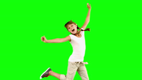 little girl jumping on green screen