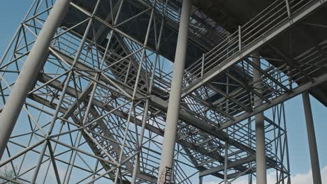 Steel-frame-structure-of-abandoned-hospital-with-stairs,-Zagreb,-Croatia