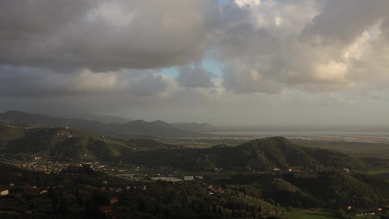 Stunning Panoramic View of Rolling Hills and Coastal Landscape