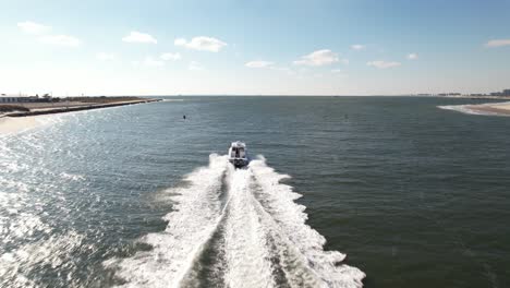 an aerial view over the east rockaway inlet in queens, ny on a beautiful, sunny day